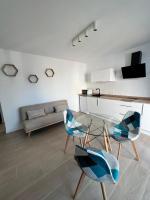TV a/nebo společenská místnost v ubytování Apartamentos Buganvilla Roquetas de Mar