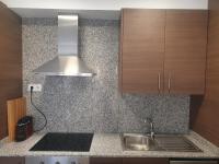 Kuchyň nebo kuchyňský kout v ubytování Apartament Cèntric a Ribes de Freser Vall de Núria
