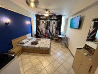 A television and/or entertainment centre at Jordans rooms 4
