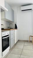 Plan piętra w obiekcie Appartement avec garage à Mèze