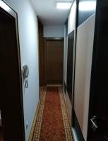 a hallway with a door leading to a room at Apartman Elena in Vrnjačka Banja