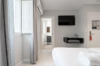 A bed or beds in a room at Ultreia Seven Rooms by Adeloló