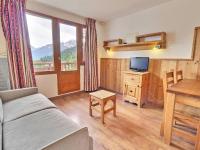 Televízia a/alebo spoločenská miestnosť v ubytovaní Charmant Appartement à La Tania - 4 personnes, 25m², Balcon, au pied des pistes - FR-1-182A-26