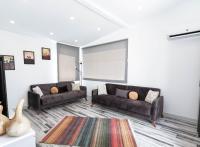 A seating area at La Brezza Suite & Hotel