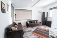 A seating area at La Brezza Suite & Hotel