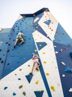 two people on an indoor climbing wall at Falkensteiner Family Hotel Diadora in Zadar