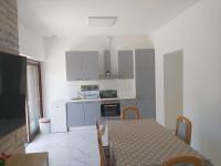 Kuchnia lub aneks kuchenny w obiekcie Apartmani Totić