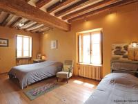 Posteľ alebo postele v izbe v ubytovaní Maison de charme avec piscine intérieure, grand jardin, et paysages magnifiques en pleine campagne - FR-1-497-164