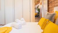 Postel nebo postele na pokoji v ubytování La Quinta Calle - Apartamentos Aloha Toledo