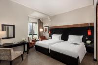 Ein Bett oder Betten in einem Zimmer der Unterkunft Oaks Ibn Battuta Gate Dubai