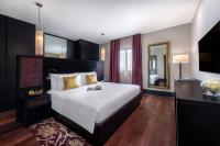Ein Bett oder Betten in einem Zimmer der Unterkunft Oaks Ibn Battuta Gate Dubai