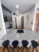 A kitchen or kitchenette at La Dorada