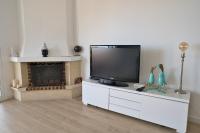Televízia a/alebo spoločenská miestnosť v ubytovaní Maison à Mascarat Hills avec vue sur la baie d'Altea