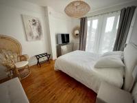 Łóżko lub łóżka w pokoju w obiekcie Suites Mana - Le Manaloft, Chic et moderne avec salle privée de Fitness en plein centre-ville de Rethel