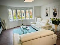 Część wypoczynkowa w obiekcie Suites Mana - Le Manaloft, Chic et moderne avec salle privée de Fitness en plein centre-ville de Rethel