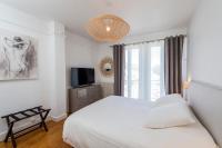 Łóżko lub łóżka w pokoju w obiekcie Suites Mana - Le Manaloft, Chic et moderne avec salle privée de Fitness en plein centre-ville de Rethel