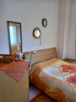 Posteľ alebo postele v izbe v ubytovaní Spacious 2-bedroom vacation home with sea view