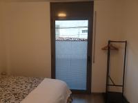 Postel nebo postele na pokoji v ubytování Apartament Cèntric a Ribes de Freser Vall de Núria