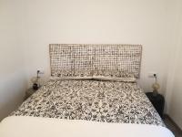 Postel nebo postele na pokoji v ubytování Apartament Cèntric a Ribes de Freser Vall de Núria