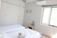 Posteľ alebo postele v izbe v ubytovaní Beautiful apartment in Plomari
