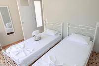 Posteľ alebo postele v izbe v ubytovaní Beautiful apartment in Plomari