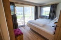 Posteľ alebo postele v izbe v ubytovaní Chalet am Wiesenweg