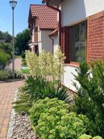 Vonkajšia záhrada v ubytovaní Apartament Łebska Ostoja