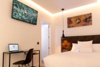 TV a/nebo společenská místnost v ubytování Woohoo Rooms Boutique Sol