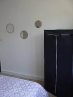 Postel nebo postele na pokoji v ubytování Spacieux appartement au pied de la cité médiévale