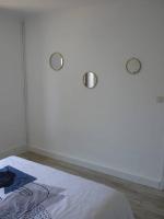 Postel nebo postele na pokoji v ubytování Spacieux appartement au pied de la cité médiévale