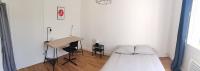 Łóżko lub łóżka w pokoju w obiekcie Belle Maison 12p 6 couchages TOURS CENTRE avec jardin