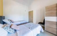 Postel nebo postele na pokoji v ubytování Holiday Home Betiga Betiga Iii