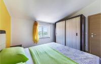 Postel nebo postele na pokoji v ubytování Holiday Home Betiga Betiga Iii