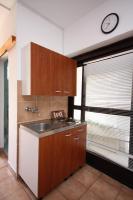 Kuchyň nebo kuchyňský kout v ubytování Apartments by the sea Murter - 5078