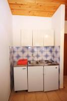 Een keuken of kitchenette bij Apartments with a parking space Jezera, Murter - 5093