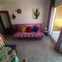 A seating area at Apartamento cerca Playa Napoli II
