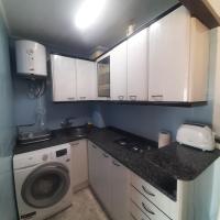 A kitchen or kitchenette at Apartamento cerca Playa Napoli II