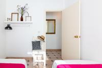 Posteľ alebo postele v izbe v ubytovaní Sea & Wave Al Rolo Beach Apartment