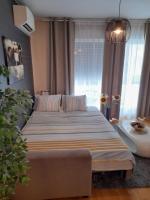 Postel nebo postele na pokoji v ubytování Calla apartment Zagreb - NOVI APARTMAN, GARAŽA, VIDEO NADZOR