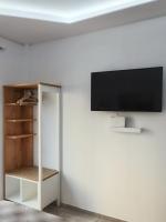 A television and/or entertainment centre at Alfa Studio