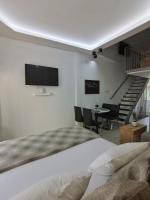 A television and/or entertainment centre at Alfa Studio