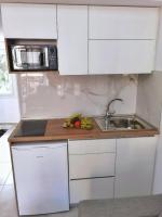 A kitchen or kitchenette at Alfa Studio