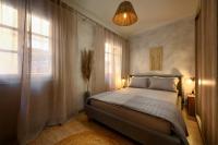 Posteľ alebo postele v izbe v ubytovaní The In Town Apartment - With a Private Terrace