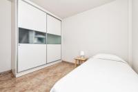 Posteľ alebo postele v izbe v ubytovaní New Cute Apartment at Salinetas Beach.