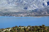 an aerial view of a lake in front of a mountain at Apartment Seline 11197b in Starigrad