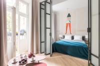 Posteľ alebo postele v izbe v ubytovaní Cadena Gallery Apartments Witkacy