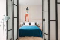 Posteľ alebo postele v izbe v ubytovaní Cadena Gallery Apartments Witkacy