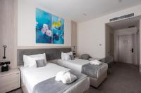 Hotel Inspira-S Tashkentにあるベッド