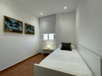 Postel nebo postele na pokoji v ubytování El Mirador del Coto, Apartamentos Living Sur
