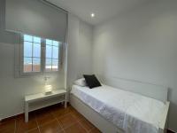 Postel nebo postele na pokoji v ubytování El Mirador del Coto, Apartamentos Living Sur